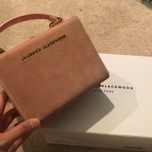 Brandon Blackwood pink suede trunk